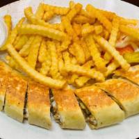 Chicken Platter · sliced  sandwiche and fries and pickle and suace