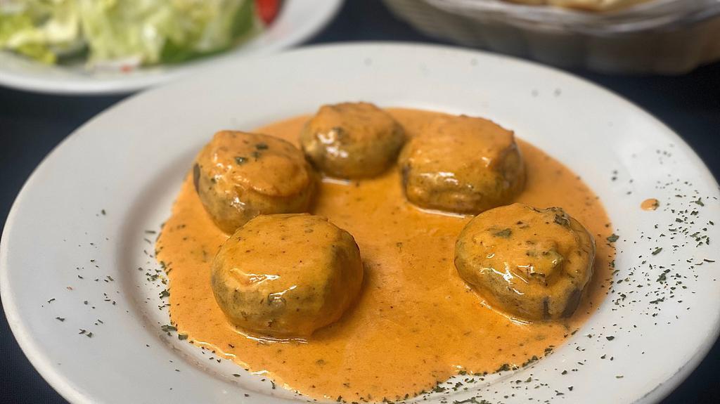 Stuffed Mushrooms · Mushroom's stuffed with crabmeat. Baked & served with pink vodka sauce.