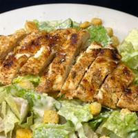 Chicken Caesar Salad · Romaine lettuce, croutons & parmesan cheese topped with grilled chicken with homemade Caesar...