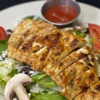 Venezia Chicken Salad · A mix of greens with black olives, mushrooms, and tomatoes. Topped with grilled chicken, moz...