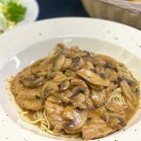 Veal Marsala
 · Tender veal sautéed with mushrooms in rich marsala wine sauce. Served with pasta.