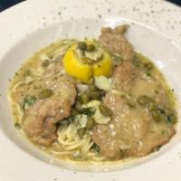 Veal Piccata
 · Tender veal sautéed with capers in our garlic lemon white wine sauce. Served with pasta.