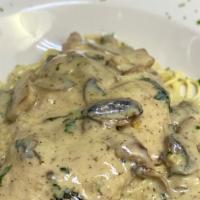 Veal Venezia
 · Cooked veal sautéed with mushrooms, shallots and dill, in our brandy cream sauce. Served wit...