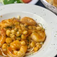 Shrimp And Scallops Fra Diavolo
 · Shrimp and scallops sautéed with basil & garlic in a spicy marinara sauce. Served with pasta.