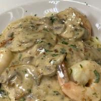 Chicken And Shrimp
 · Chicken and shrimp sautéed with mushrooms, shallots & dill in brandy cream sauce. Served wit...