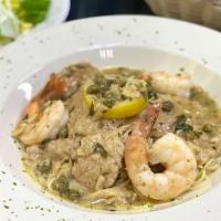 Veal And Shrimp Piccata · Tender veal and shrimp sautéed with capers in our garlic lemon white wine sauce. Served with...