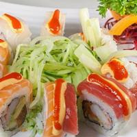 Van Gogh Roll · Spicy tuna, cucumber, avocado, kanikama, tuna, salmon, white fish, spicy mayo and sriracha o...