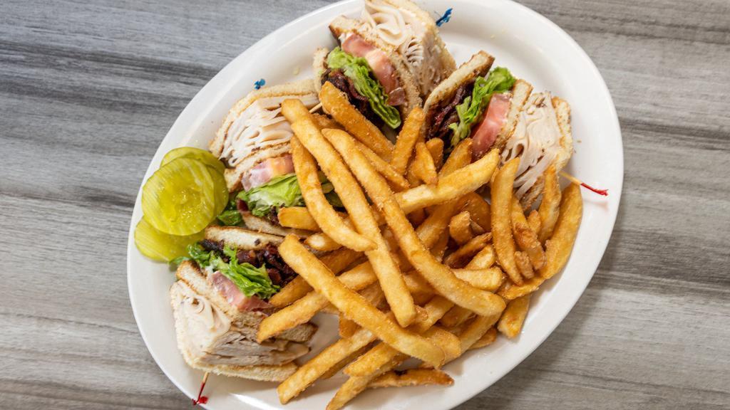 International Club Sandwich · Beef Bacon, lettuce, tomatoes, turkey, pickles, and mayo.