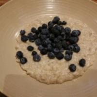 Blueberry Oatmeal · BROWN SUGAR OATMEAL WITH FRESH BLUEBERRIES AND A HONEY SWIRL!