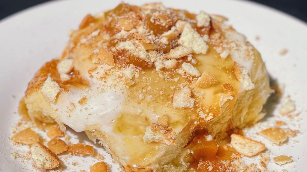 Peach Cobbler · Enjoy A Homemade Classic Golden Brown Buttery, Sweet And Fluffy Sweet Roll. Topped With Granny's Secret Scrumptious Creamy, Smooth One Of A Kind Glaze And Home Made Peach Cobbler Sauce And Crushed Vanilla Cookies.