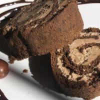 Chocolate Roll Cake · Sri Lankan style chocolate swiss roll glazed with Hershy chocolate syrup