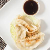Dumplings (5) · Filled with seasoned chicken and scallions. Served with our homemade soy sauce. Can be stir ...