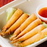 Shrimp In A Blanket (6) · Lightly crisp spring rolls skin wrapped around our marinated shrimp. Served with our homemad...