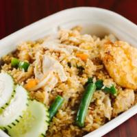 Sweet Chili Fried Rice · Spicy. Jasmine rice stir fried with bell peppers, onions, scallions, green beans, carrots, e...