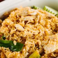 Curry Fried Rice · Spicy. Jasmine rice fried with bell peppers, onions, scallions, egg, and pad prik king curry...