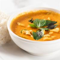 Red Curry · Red curry chili paste in coconut milk with bamboo shoot, bell pepper and basil.