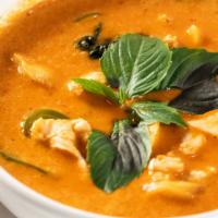 Panang Curry · Panang curry chili paste in coconut milk with pineapple, bamboo shoot, bell pepper and basil.