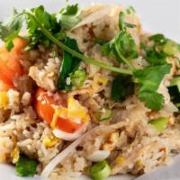 Thai Fried Rice · Thai style fried rice with choice of meat, egg, tomato, onion and scallion.