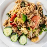 Basil Fried Rice · Fried rice with choice of meat, egg, broccoli, bell pepper, basil, yellow onion and tomato.