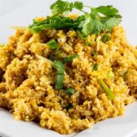 Curry Fried Rice · Fried rice stir fried with curry powder, choice of meat, egg, yellow onion, scallion and tom...