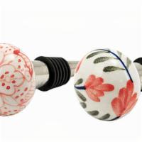 Assorted Floral Stoppers · Preserve your wine in style with ceramic floral bottle stoppers.

The secure rubber ring ens...