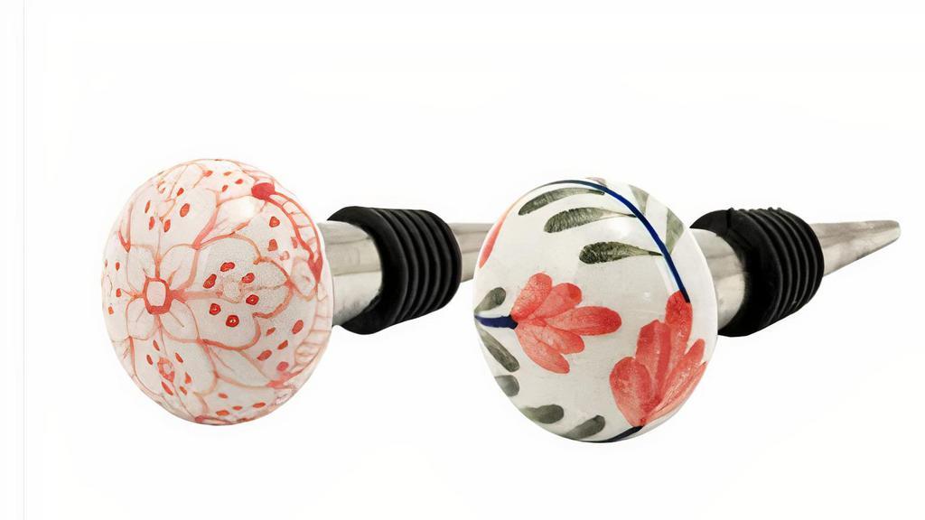Assorted Floral Stoppers · Preserve your wine in style with ceramic floral bottle stoppers.

The secure rubber ring ensures a secure fit while the artful ceramic adds a decorative touch to any bottle