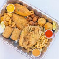 Grand Daddy Platter · served w/ 2Pc Cajun fried Fish , 8 Pc of Cajun Fried Shrimp, 2 Boudin Balls , 2pc Cajun Frie...