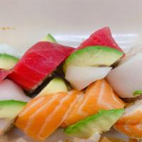 Rainbow Roll · California roll with salmon, tuna shrimp, white tuna and avocado on top.