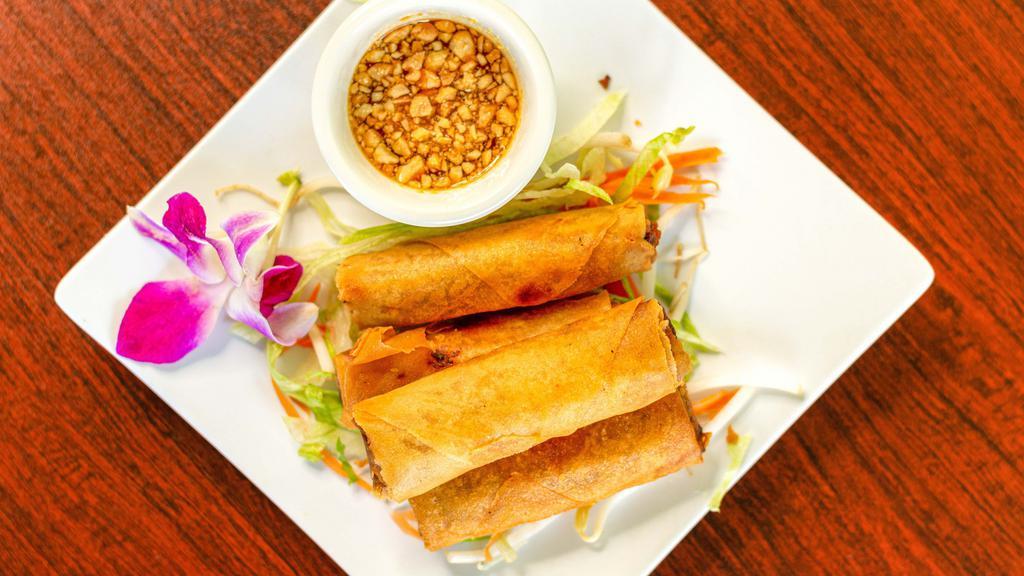 Thai Crispy Egg Roll (4) · Best seller! 
Crispy filled with pork, crystal noodles, carrots, onion served with a delicious sweet and sour sauce.