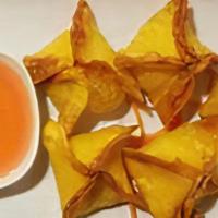 Crab Rangoon (4) · Deep-fried wonton, cream cheese, onions, crab meat Served with sweet and sour sauce.