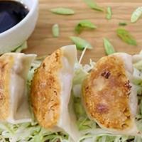 Pot Stickers (6) · Steamed or pan-seared dumplings served with a ginger sweet and soy sauce.