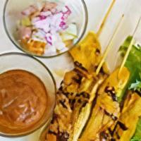 Chicken Satay (4) · Popular Appetizer! 
Grilled marinated chicken breast in a skewer served with peanut sauce an...