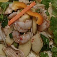 Shrimp Apple Salad  · Shrimp, chicken, and apple slices, onion, lettuce, bell pepper, and carrots
Topped with Thai...