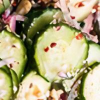 Cucumber Salad · Best Saler!
Chopped Cucumber, Lettuce, Beansprouts. Topped With Shredded Crab Meat  and Swee...