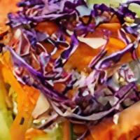 House Salad · Very healthy dish! Chopped Lettuces, Tomatoes, Bell Peppers, Onions, and Cucumbers.
Topped W...