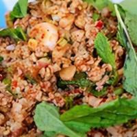 Larb Gai · Traditional Thai-Lao dish. Minced grilled chicken seasoned with freshly squeezed limes,
lemo...