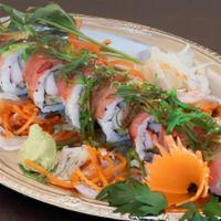 K & K  Roll  · Salmon, white tuna, and avocado Topped with tuna, seaweed salad and spicy sauce