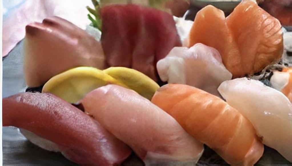 Sashimi & Sushi Combo  · (2) pieces sashimi, tuna, salmon, and yellowtail  (2) pieces nigiri , tuna, salmon, yellowtail and shrimp