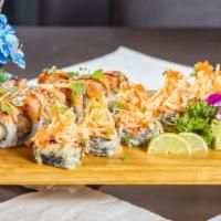 Hollywood Roll · Hot & spicy. Spicy tuna and avocado rolled and deep-fried, topped with kani salad, spicy may...