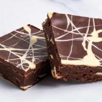 Tuxedo Brownies · Dark chocolate and white fudge swirled into a rich brownie.