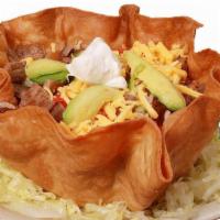 Taco Salad · Choice of fajita, chicken or ground beef (does not include beans and rice).