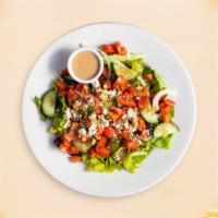 Old Greek Town Salad · Tender hearts of romaine tossed with a Greek oregano vinaigrette, topped with creamy feta ch...