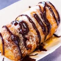 Deep Fried Snickers Bar · Fried Snickers topped with powdered sugar