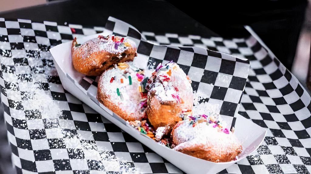 Classic Fried Oreos · Topped with powdered sugar and sprinkles.