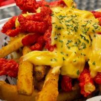 Hot Fries · Fries topped with hot cheetos and cheese sauce.