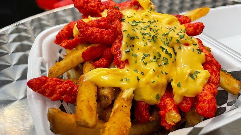 Hot Fries · Fries topped with hot cheetos and cheese sauce.