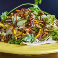 Chinese Chicken Salad · Our salad mix (iceberg lettuce, carrots, red cabbage, and romaine lettuce), tortilla chips, ...