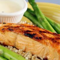 Grilled Salmon Filet · 8oz filet of grilled salmon served with hearty grain rice and the vegetable of the day and a...