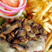 Mushroom Swiss Burger · Topped with Swiss cheese and sautéed mushrooms. Served open-faced with mayo, lettuce, tomato...