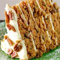 Big Carrot Cake · Subtly spiced and generously covered with cream cheese icing. This delectable cake is filled...